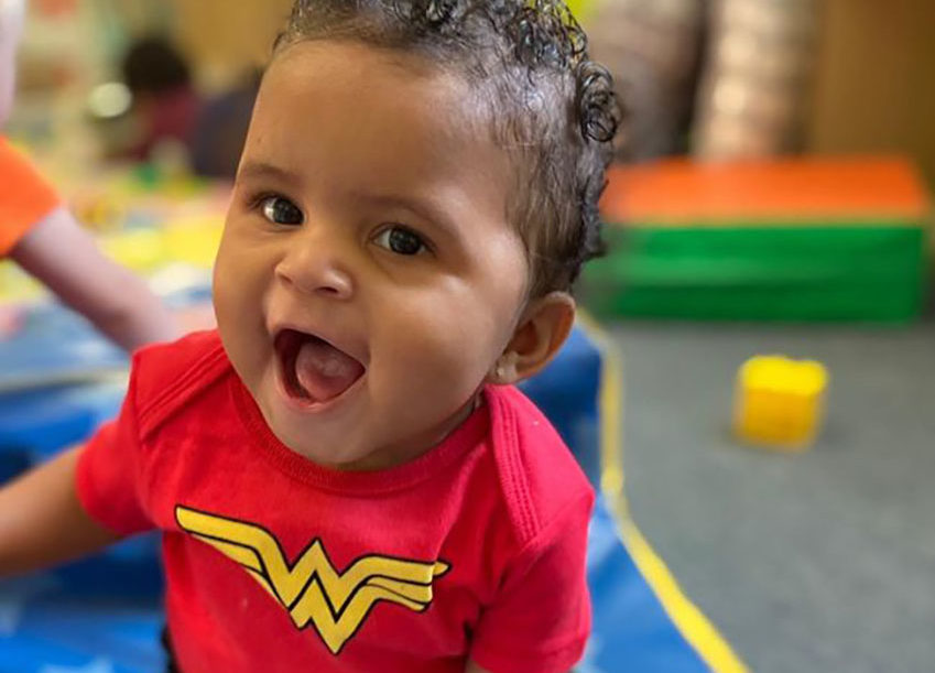 cute smiling baby girl at a Preschool & Daycare Serving Columbus, OH